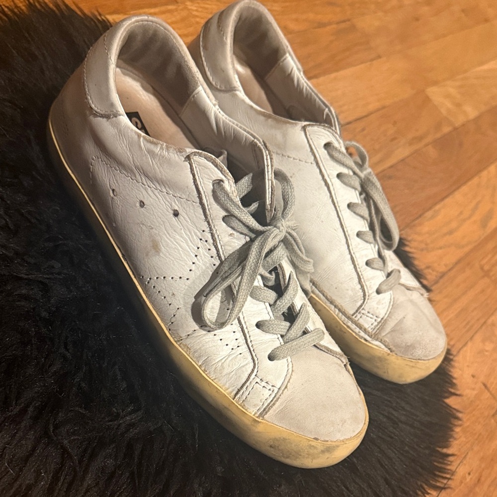 Golden Goose Super-Star white leather sneakers.